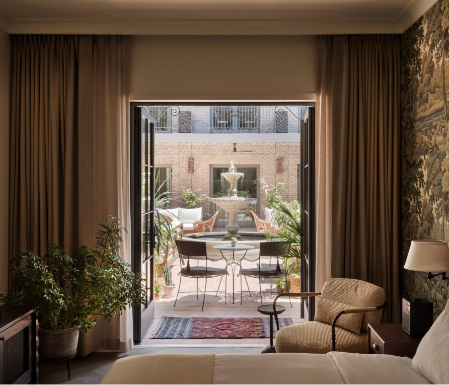 A guest room at the Nickel Hotel opening onto a courtyard
