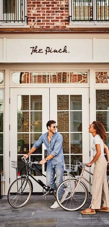 Guests with bicycles outside The Pinch Charleston