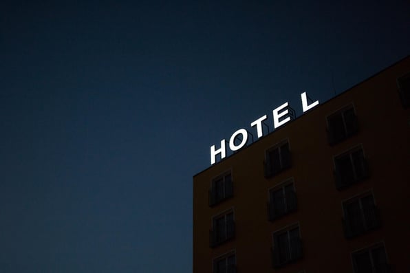 a landscape picture of a hotel building at night 