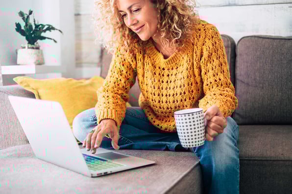 Woman checking hotel reviews on her computer