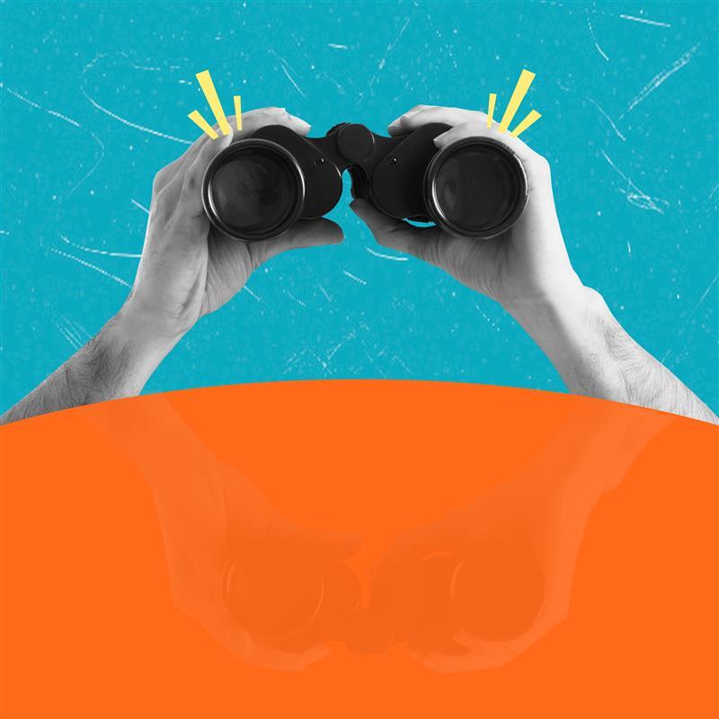 person holding binoculars 